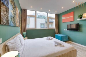 1 bedroom, desk, iron/ironing board, travel cot