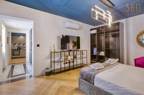 1 bedroom, desk, iron/ironing board, travel crib