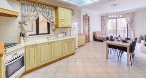 Fridge, stovetop, coffee/tea maker, toaster