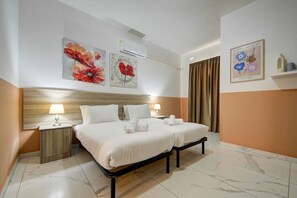3 bedrooms, desk, iron/ironing board, travel cot