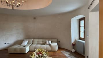 Superior Apartment | Living area | 40-inch Smart TV with digital channels