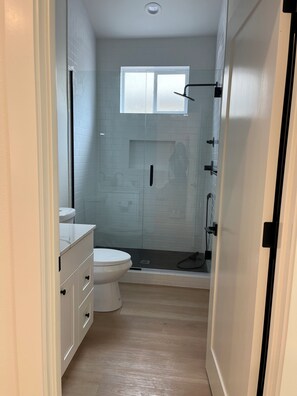 Hair dryer, towels, soap, shampoo