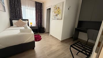 Basic Single Room | Free minibar, in-room safe, blackout drapes, free WiFi