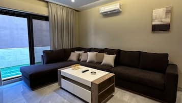 Apartamento, 1 quarto, acessível, para fumantes | Sala de estar