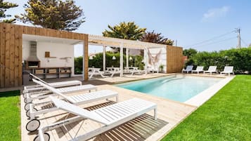Outdoor pool, open 9:00 AM to 8:00 PM, sun loungers