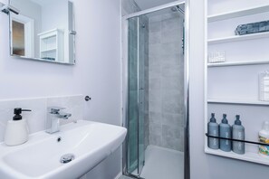 Hair dryer, towels, soap, shampoo