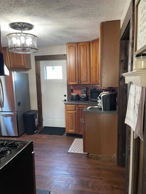 Een magnetron, een oven, een kookplaat