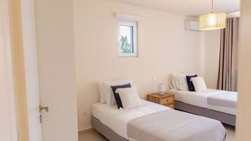 Luxury Apartment, Pool View | In-room safe, blackout drapes, iron/ironing board, free WiFi