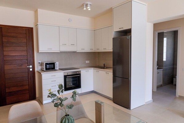 Luxury Apartment, Pool View | Private kitchen