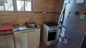 Fridge, oven, cookware/dishes/utensils