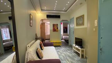 Basic Apartment | Living area | Flat-screen TV