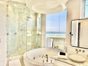 Shower, jetted bath, hair dryer, towels