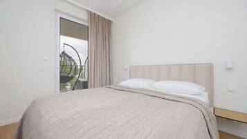 1 dormitorio, tabla de planchar con plancha, cuna de viaje y wifi