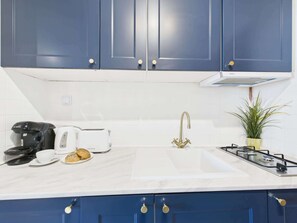 Fridge, microwave, stovetop, cookware/dishes/utensils