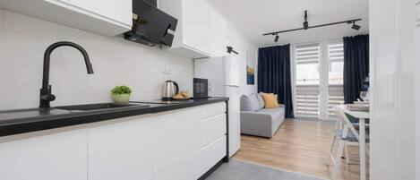 Fridge, microwave, stovetop, cookware/dishes/utensils