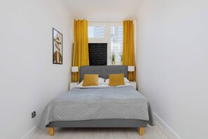 1 slaapkamer, een strijkplank/strijkijzer, reisbedje, wifi