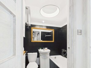 Shower, hair dryer, towels, shampoo