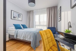 1 bedroom, desk, iron/ironing board, travel crib