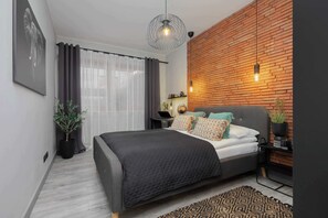 1 bedroom, desk, iron/ironing board, travel cot