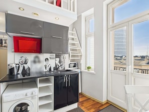 Fridge, microwave, stovetop, cookware/dishes/utensils