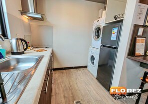 Fridge, microwave, electric kettle, cookware/dishes/utensils