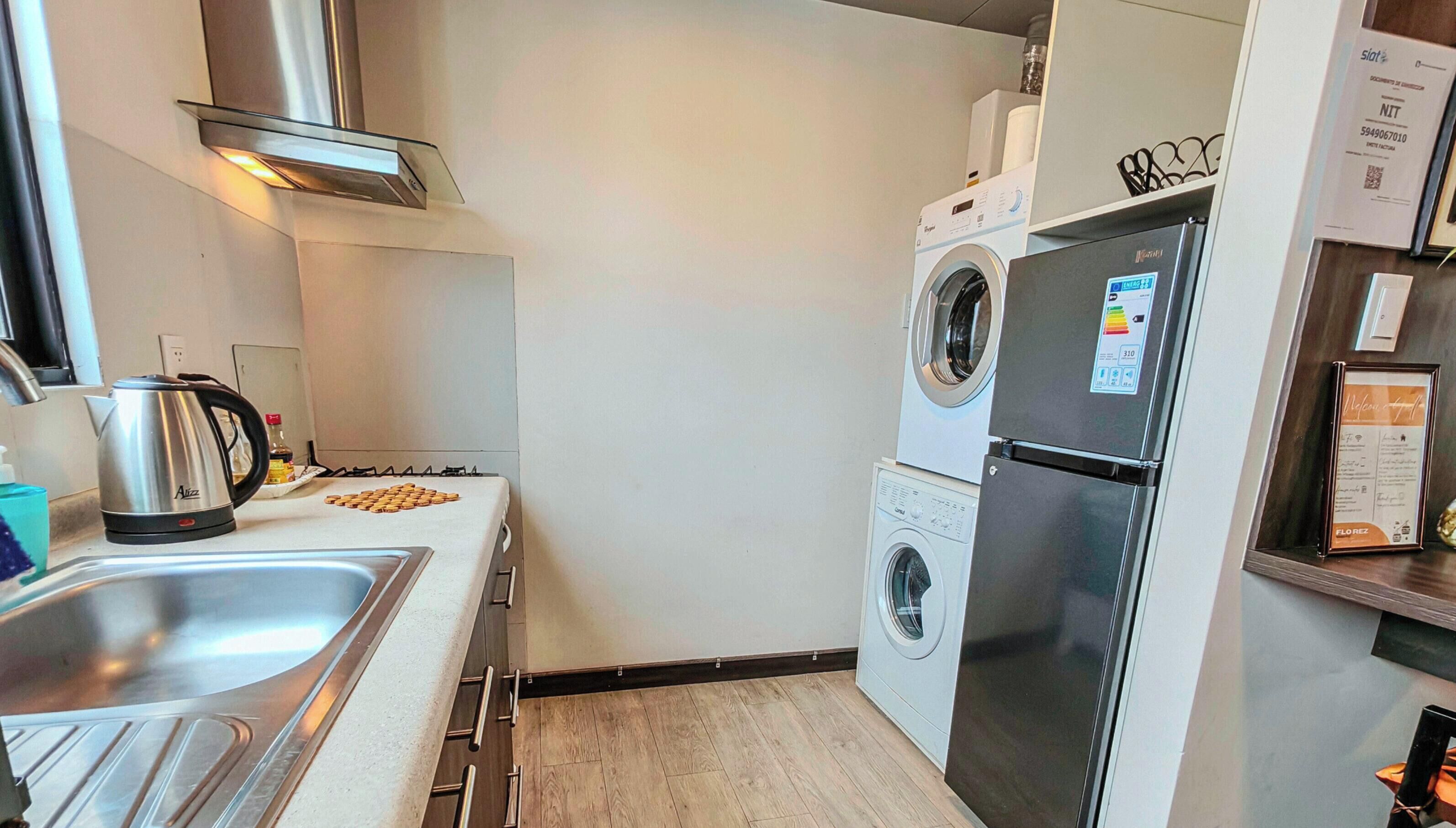 Fridge, microwave, electric kettle, cookware/dishes/utensils