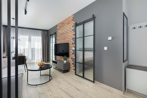Living room with a comfortable sofa and TV.