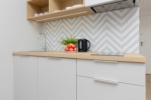 Fridge, stovetop, cookware/dishes/utensils