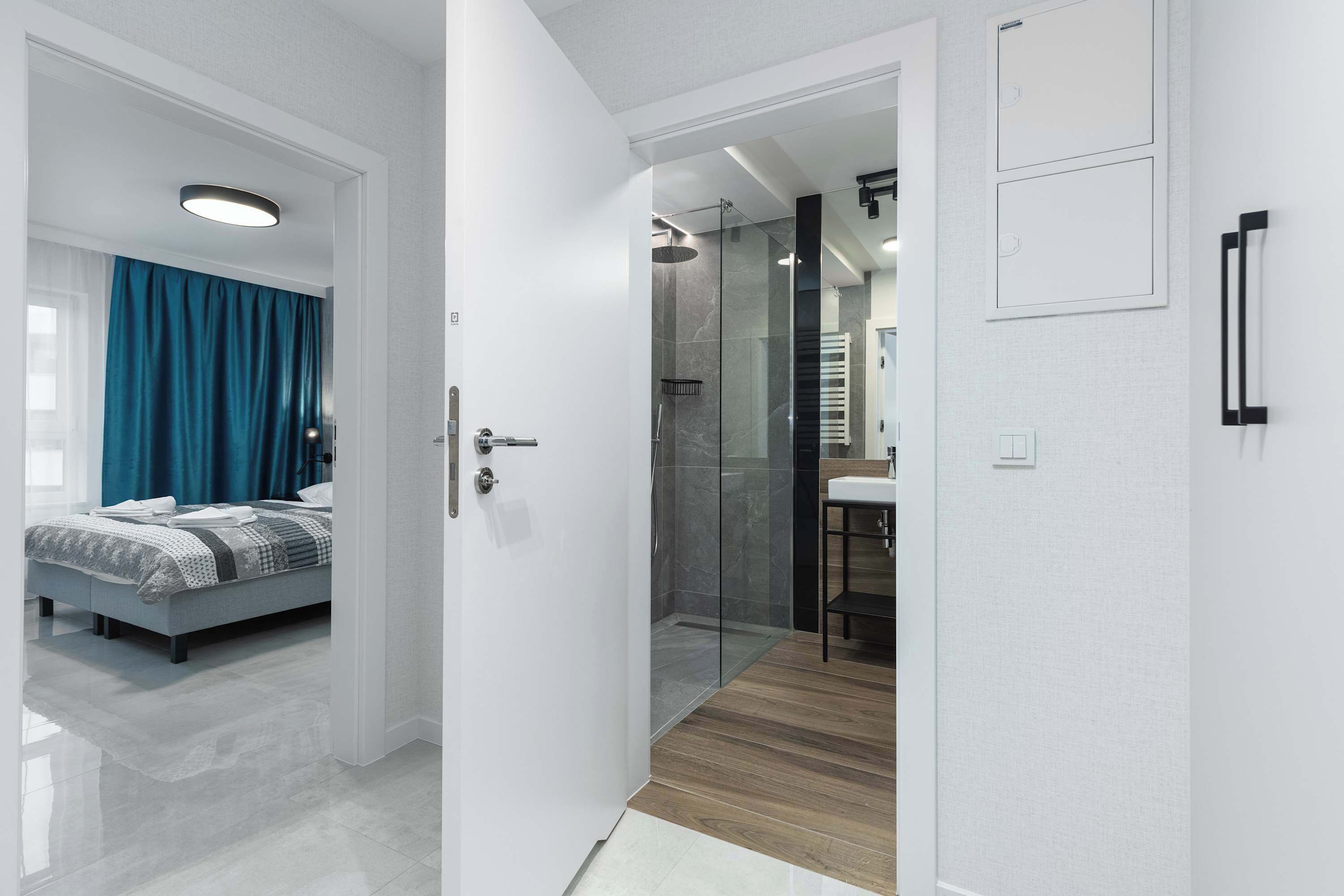 Shower, hair dryer, towels, shampoo