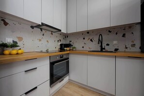 Réfrigérateur, four, plaque de cuisson, lave-vaisselle