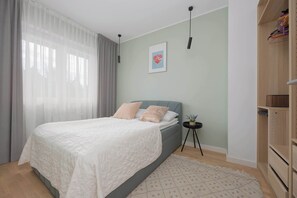 2 bedrooms, desk, iron/ironing board, travel cot