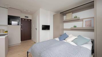 Desk, iron/ironing board, travel crib, WiFi