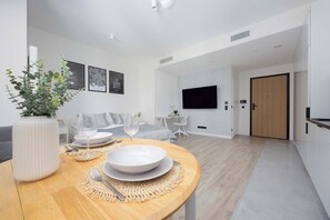 1 bedroom, desk, iron/ironing board, travel crib