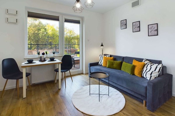 Living room with a comfortable sofa and TV.