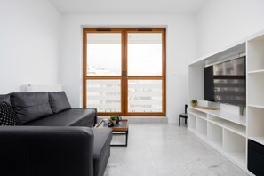 TV, offices - Zoliborz Stylish Apartment with Parking by Noclegi Renters (Warszawa)