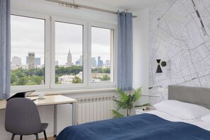 1 bedroom, desk, iron/ironing board, travel crib