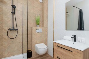 Dutxa, assecador de cabells i tovalloles 