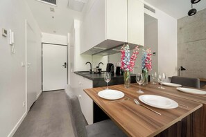 Fridge, stovetop, cookware/dishes/utensils