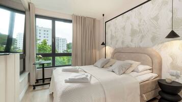 1 bedroom, desk, iron/ironing board, travel crib