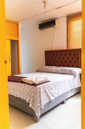 Comfort Room, Courtyard View | Desk, blackout curtains, free WiFi, bed sheets