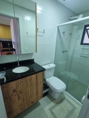 Shower, towels, soap, toilet paper
