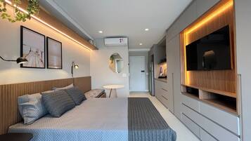 1 bedroom, desk, iron/ironing board, travel crib