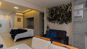 1 bedroom, desk, iron/ironing board, travel crib