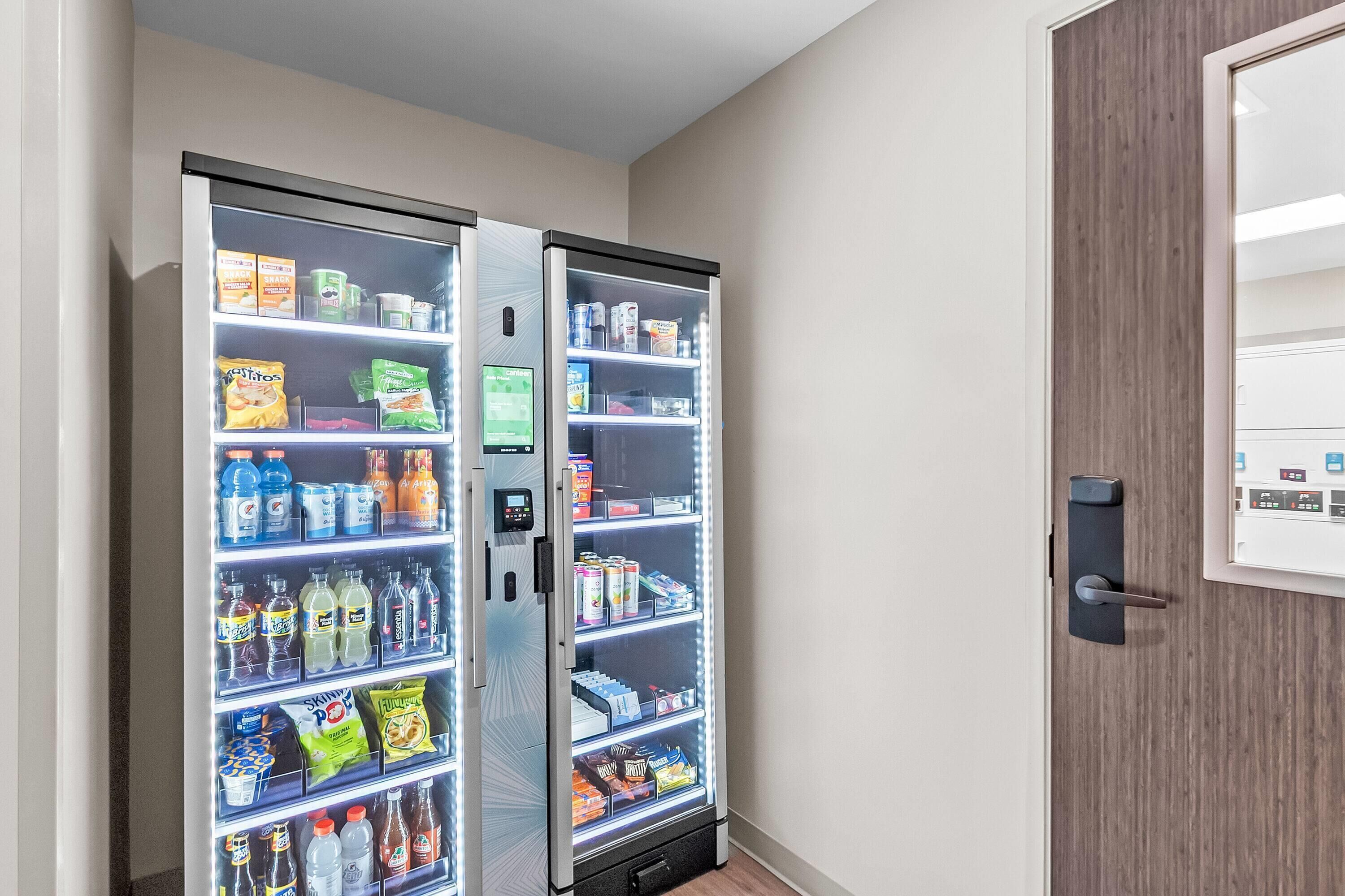 A vending machine with various snacks and drinks.