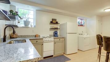 Fridge, stovetop, coffee/tea maker, cookware/dishes/utensils