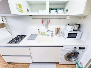 Fridge, electric kettle, toaster, cookware/dishes/utensils