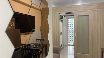 Classic Condo, Balcony, Pool View | Living area | 40-inch Smart TV with digital channels, Netflix, streaming services