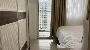 Classic Condo, Balcony, Pool View | Iron/ironing board, free WiFi, bed sheets