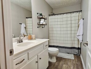 Hair dryer, towels, soap, shampoo