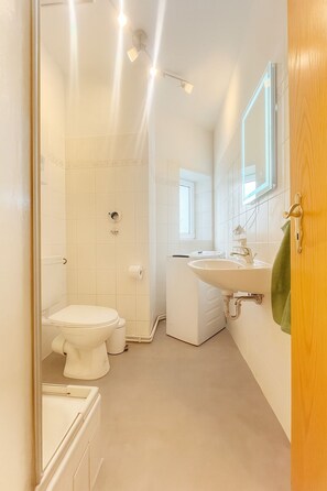 Hair dryer, towels, soap, toilet paper